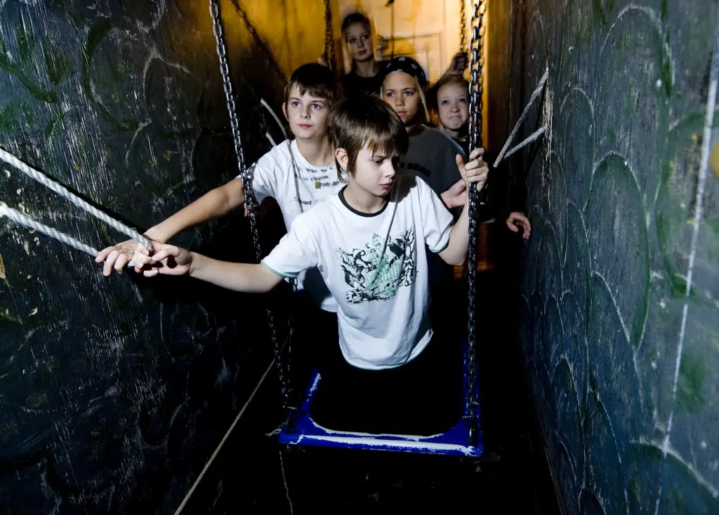 boy in a narrow hallway